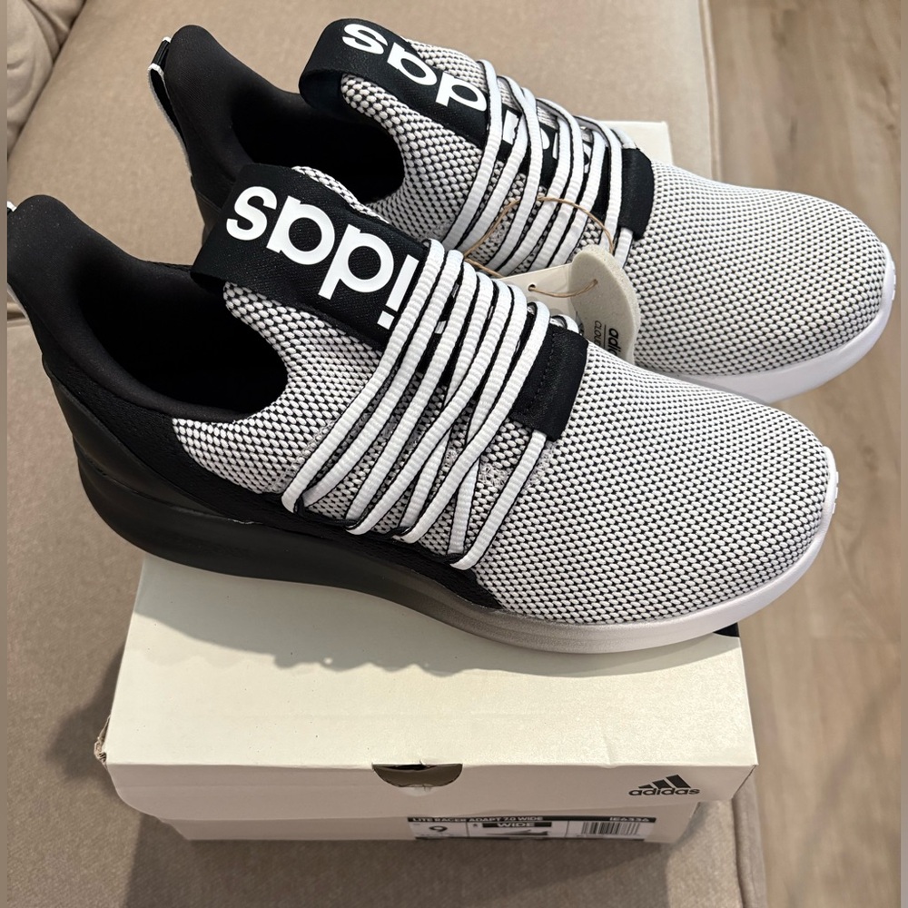 Adidas Black and White Slip-On Sneakers